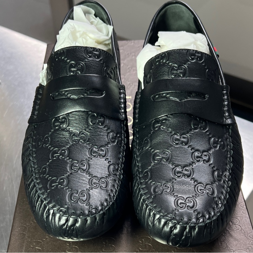 Gucci Embossed Black Leather Men's Slip-Ons